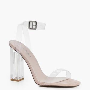 Nude heels with clear straps and heel